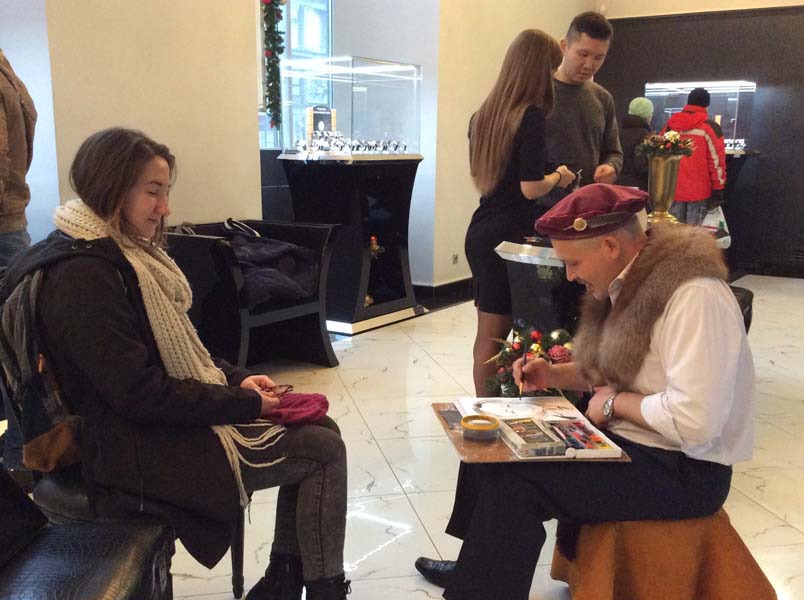 шаржист Мишель, Михаил Шабалин рисует девушку на корпоративе в магазине 