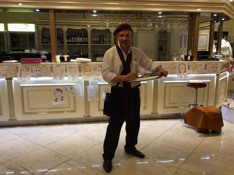 шаржист и выставка шаржей на свадьбе