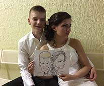 Паша и Маша позируют шаржисту, шаржист Михаил Шабалин, шаржист Мишель